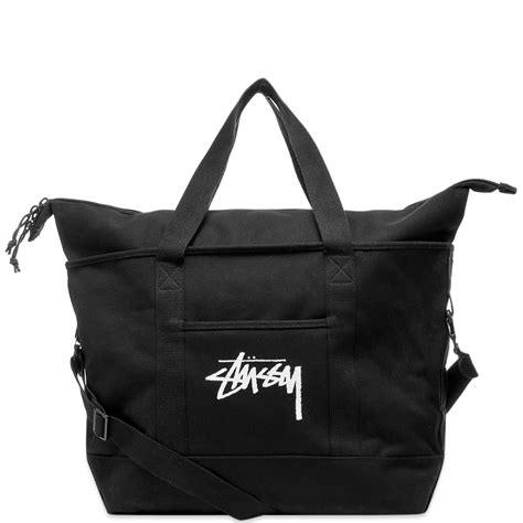 stussy shopping bag.